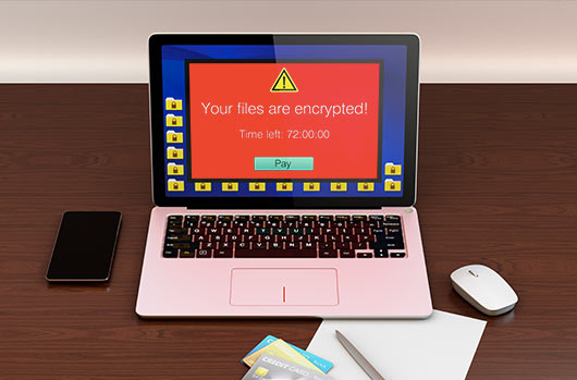 コンピューター画面上の赤いランサムウェアポップアップメッセージ